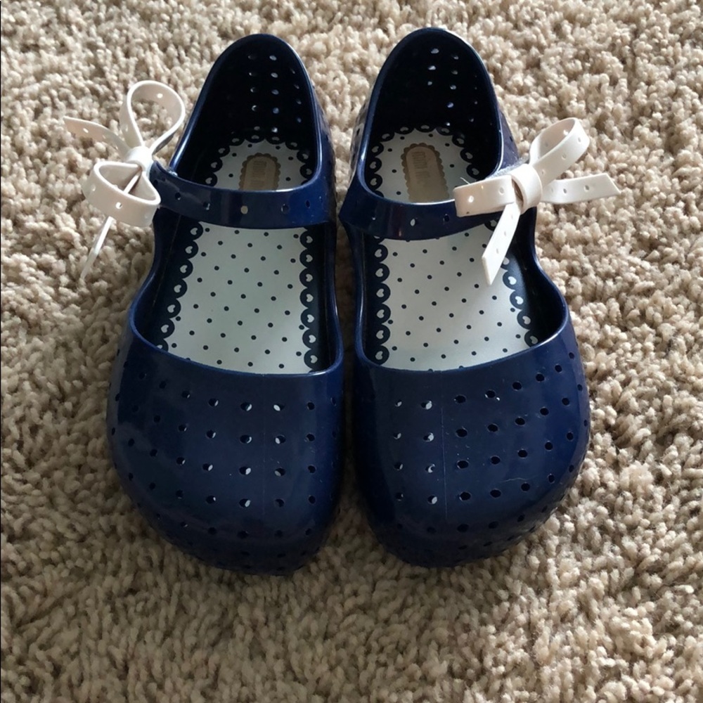 Size 10 mini Melissa navy with white bows